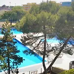 In A Poolside - Beahost Bibione